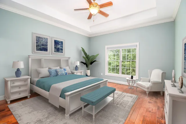 a bedroom with a bed and a couch