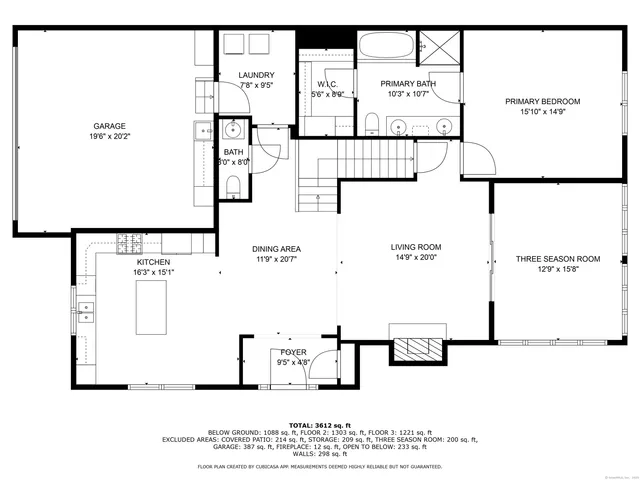 a hallway with a chair and a potted plant