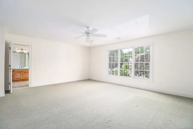 a bathroom with a sink double vanity and a mirror