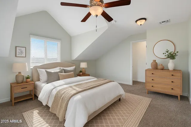 a bathroom with a toilet sink and shower