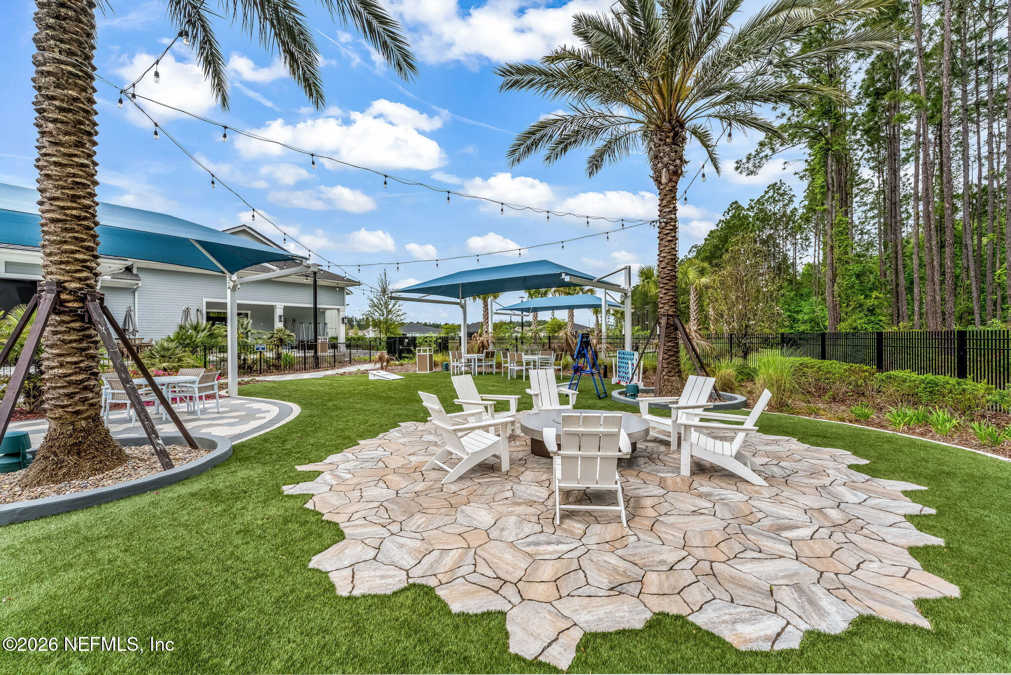 614 Ecliptic Loop Yulee, FL 32097 - Photo 55 of 60 82-web-or-mls-Game Lawn & Firepit