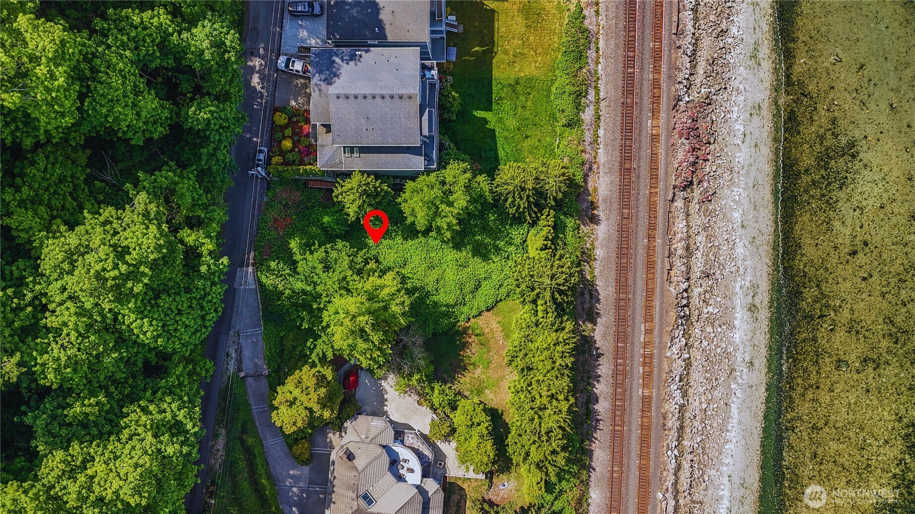 12104 Possession Lane Edmonds, WA 98026 - Photo 7 of 10 an aerial view of residential house with outdoor space and trees all around