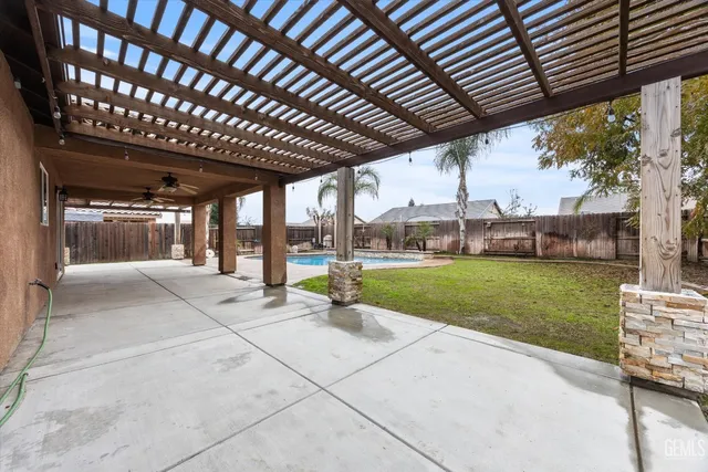 an aerial view of a house with outdoor space
