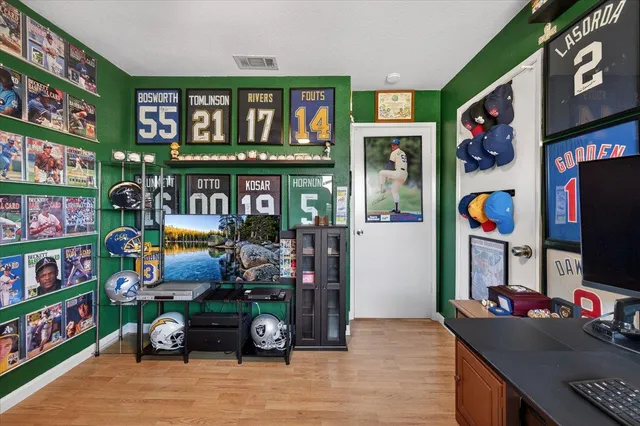 a view of a workspace with furniture