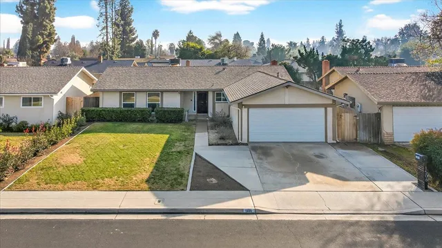 a view of a house with a swimming pool