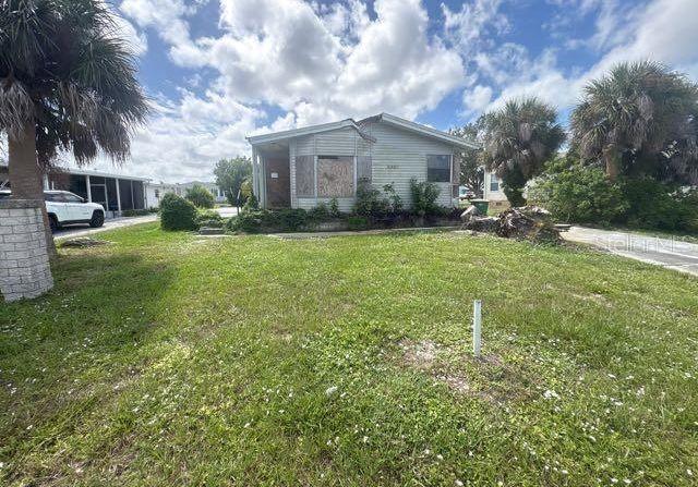 8407 Buttonquail Drive Englewood, FL 34224 - Photo 2 of 5 a view of backyard of house and green space