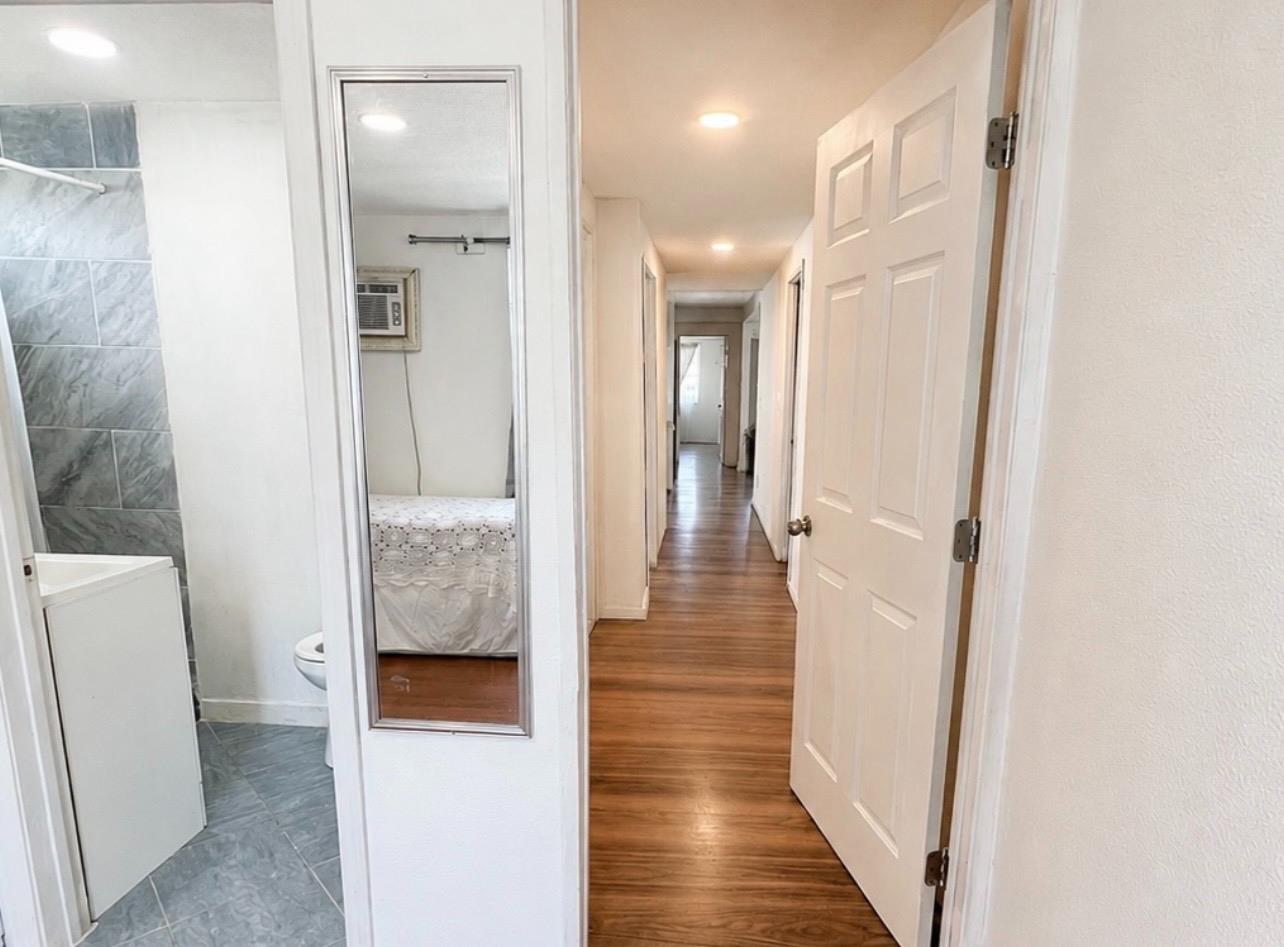 5000 Pierce Road, Unit 32 Bakersfield, CA 93308 - Photo 11 of 15 a view of a bathroom from the hallway