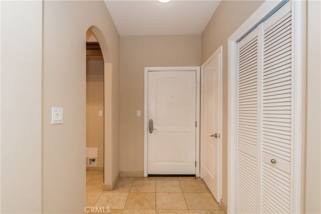 a view of a bathroom with white door