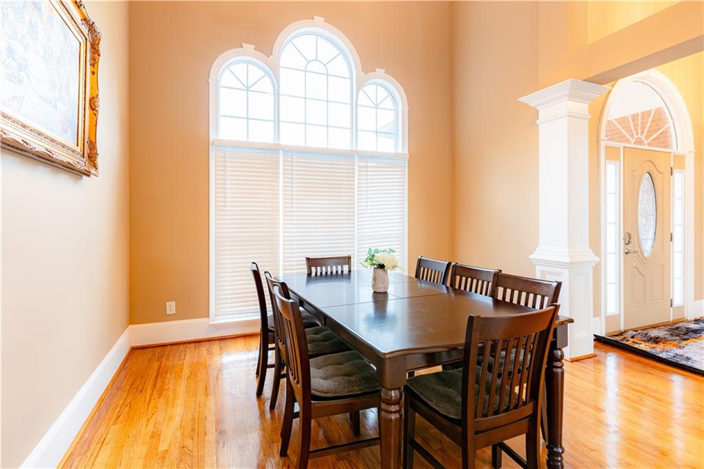 8105 Jot Em Down Road Gainesville, GA 30506 - Photo 27 of 73 a view of a dining room with furniture and a window