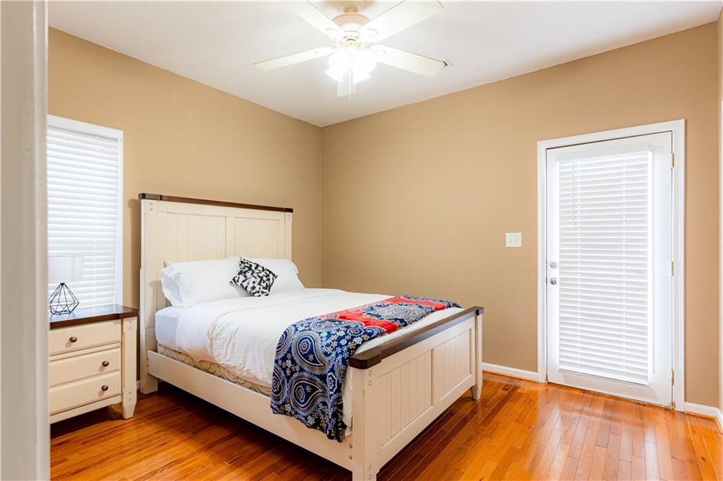 8105 Jot Em Down Road Gainesville, GA 30506 - Photo 38 of 73 a bedroom with a bed and a window