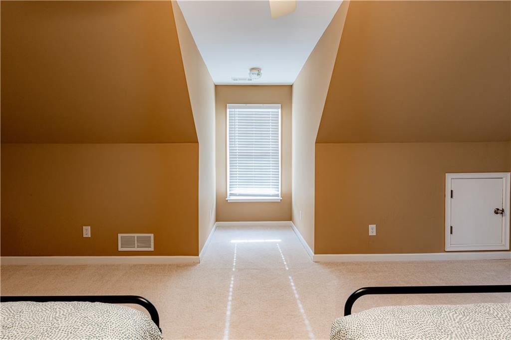 8105 Jot Em Down Road Gainesville, GA 30506 - Photo 47 of 73 a view of an empty room with windows