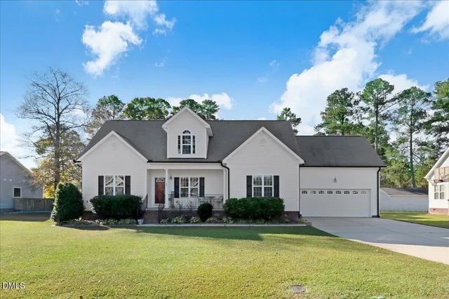 a view of a house with a swimming pool