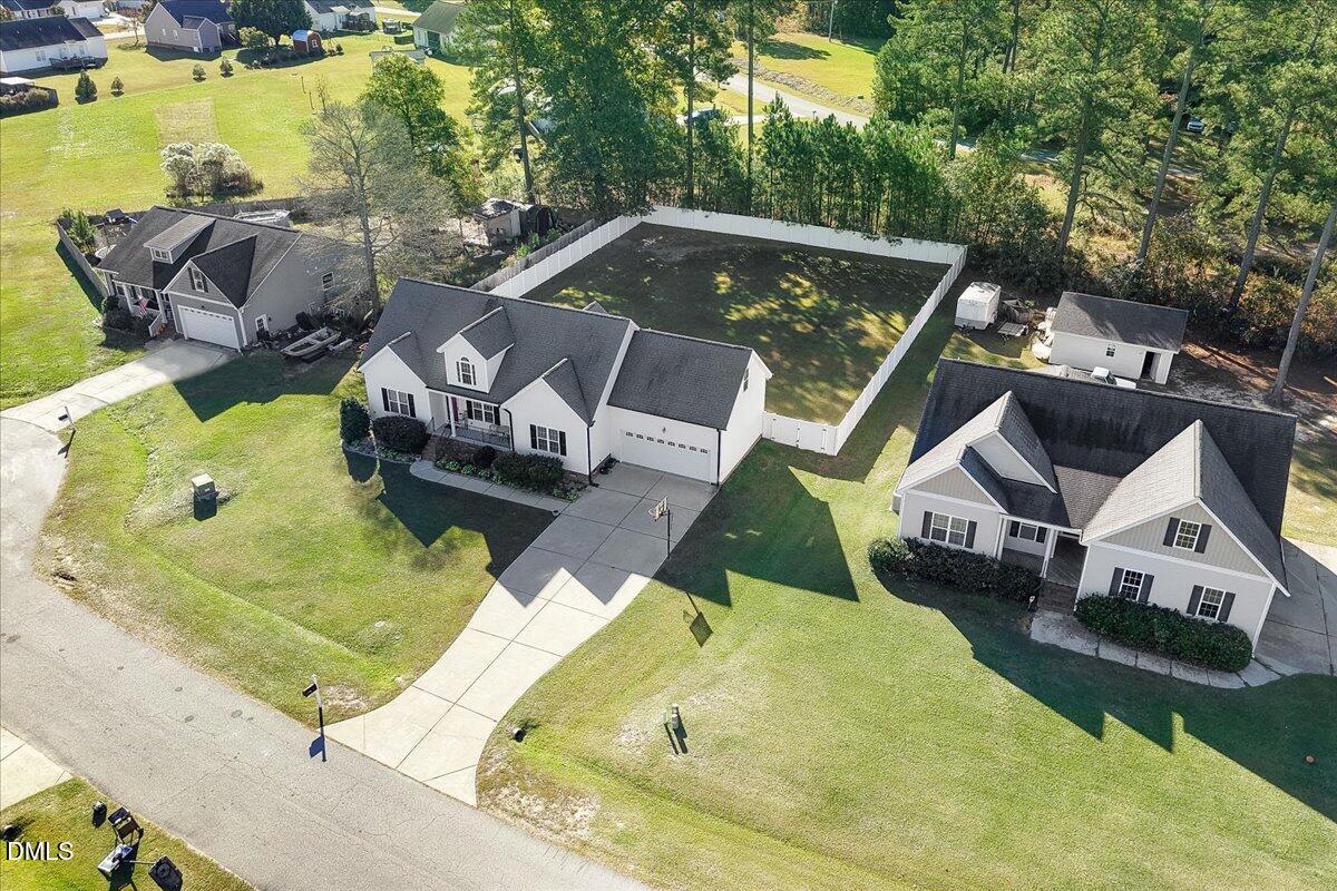 22 Quebec Drive Selma, NC 27576 - Photo 15 of 39 an aerial view of a house with swimming pool