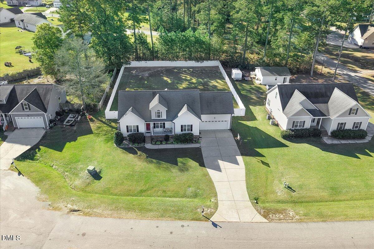 22 Quebec Drive Selma, NC 27576 - Photo 16 of 39 an aerial view of a house with swimming pool