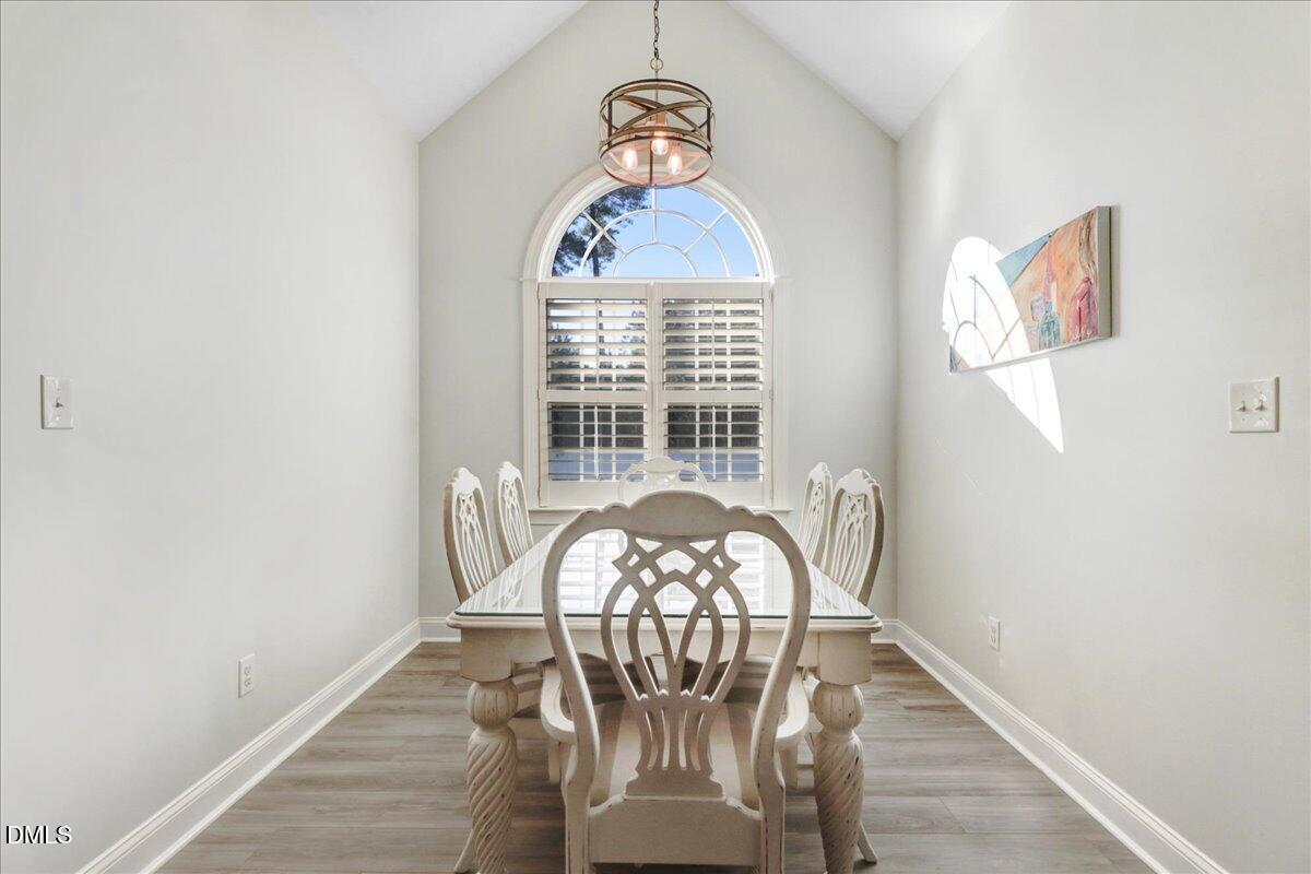 22 Quebec Drive Selma, NC 27576 - Photo 25 of 39 a view of a dining room with furniture window and wooden floor
