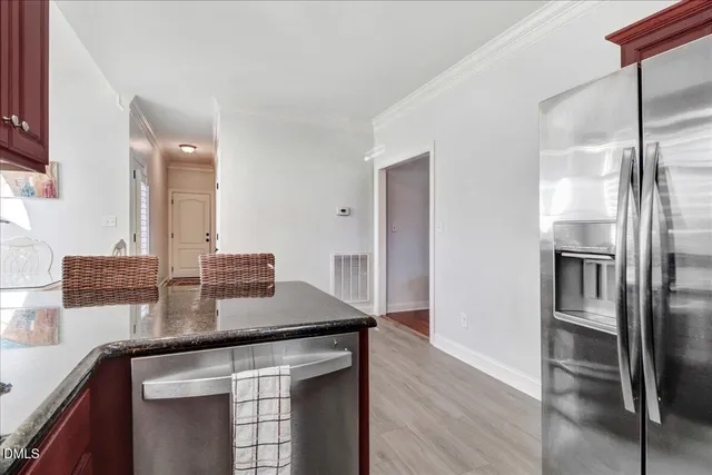 a bed room with a bed and a window