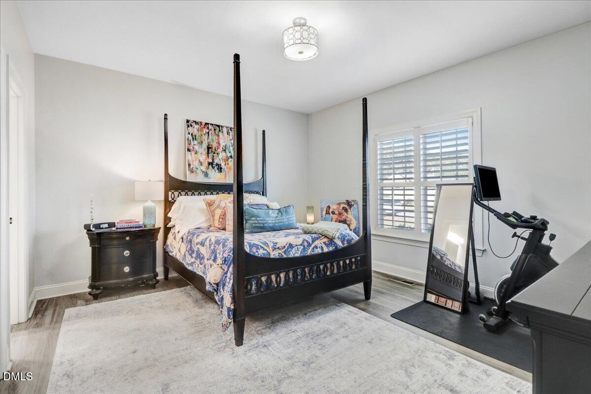 22 Quebec Drive Selma, NC 27576 - Photo 31 of 39 a bed room with a bed and a window