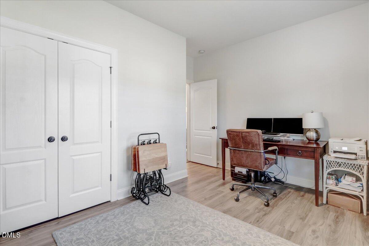 22 Quebec Drive Selma, NC 27576 - Photo 35 of 39 a view of a workspace with furniture and a window