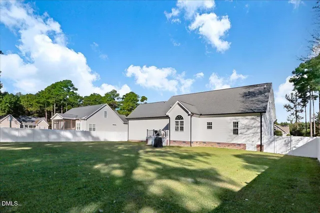 a view of house with garden