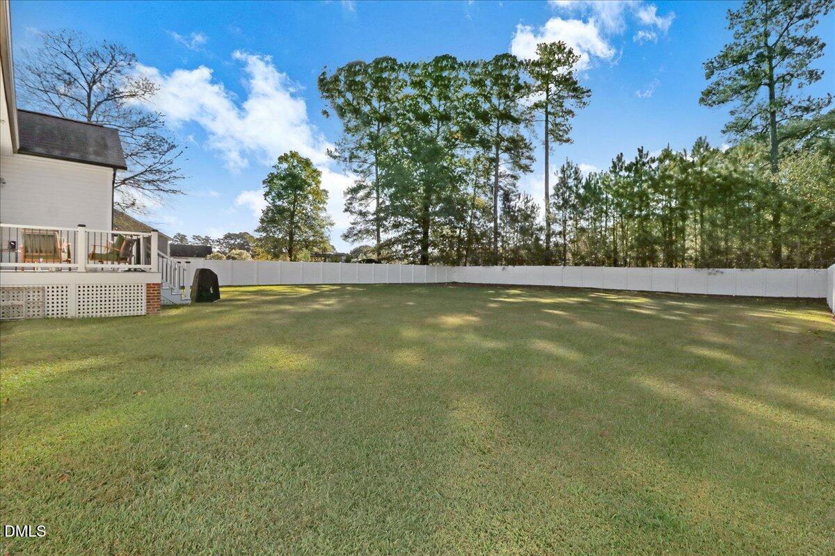 22 Quebec Drive Selma, NC 27576 - Photo 8 of 39 a view of outdoor space with garden