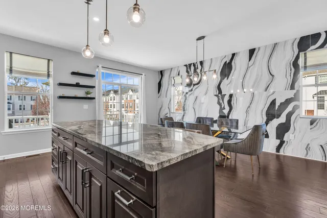 a view of a hallway with washer and dryer