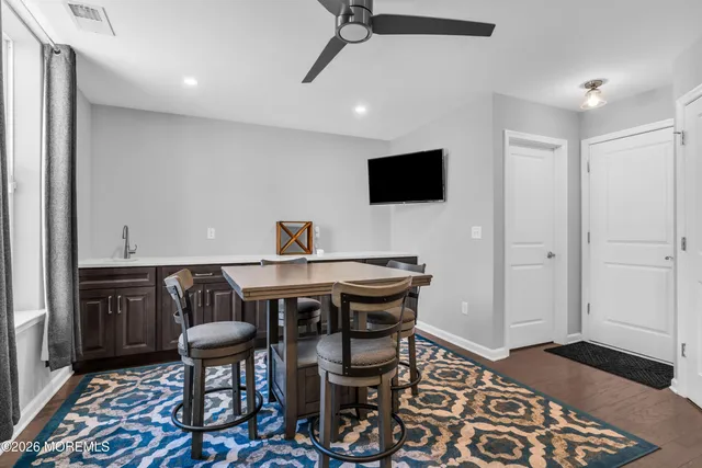 a bathroom with a sink and vanity