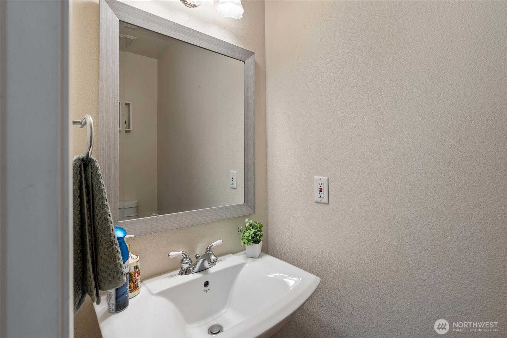 3841 Mari Lane Southeast Olympia, WA 98513 - Photo 13 of 40 a bathroom with a sink and a mirror