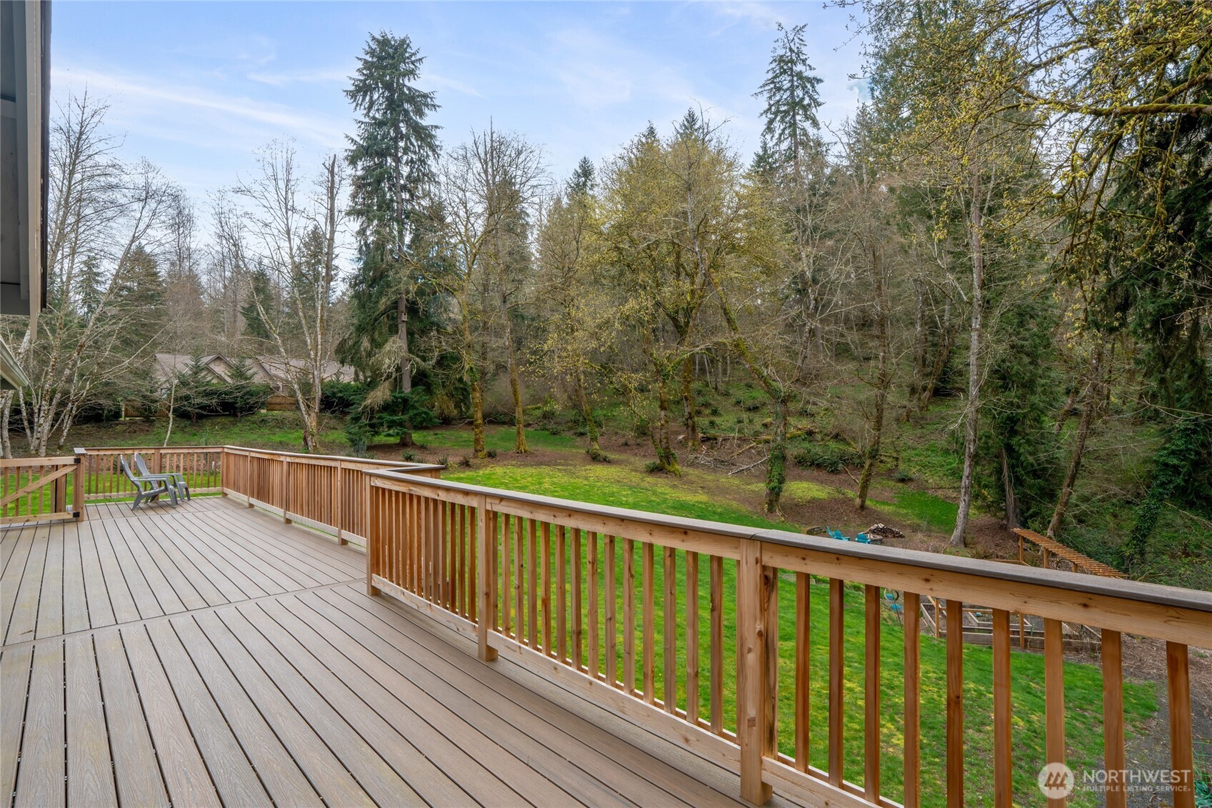 3841 Mari Lane Southeast Olympia, WA 98513 - Photo 26 of 40 a view of balcony with deck and trees
