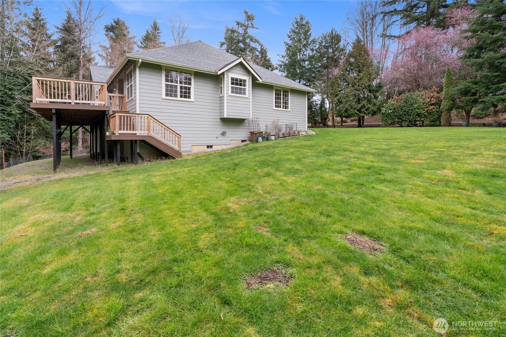 3841 Mari Lane Southeast Olympia, WA 98513 - Photo 27 of 40 a view of a house with a yard