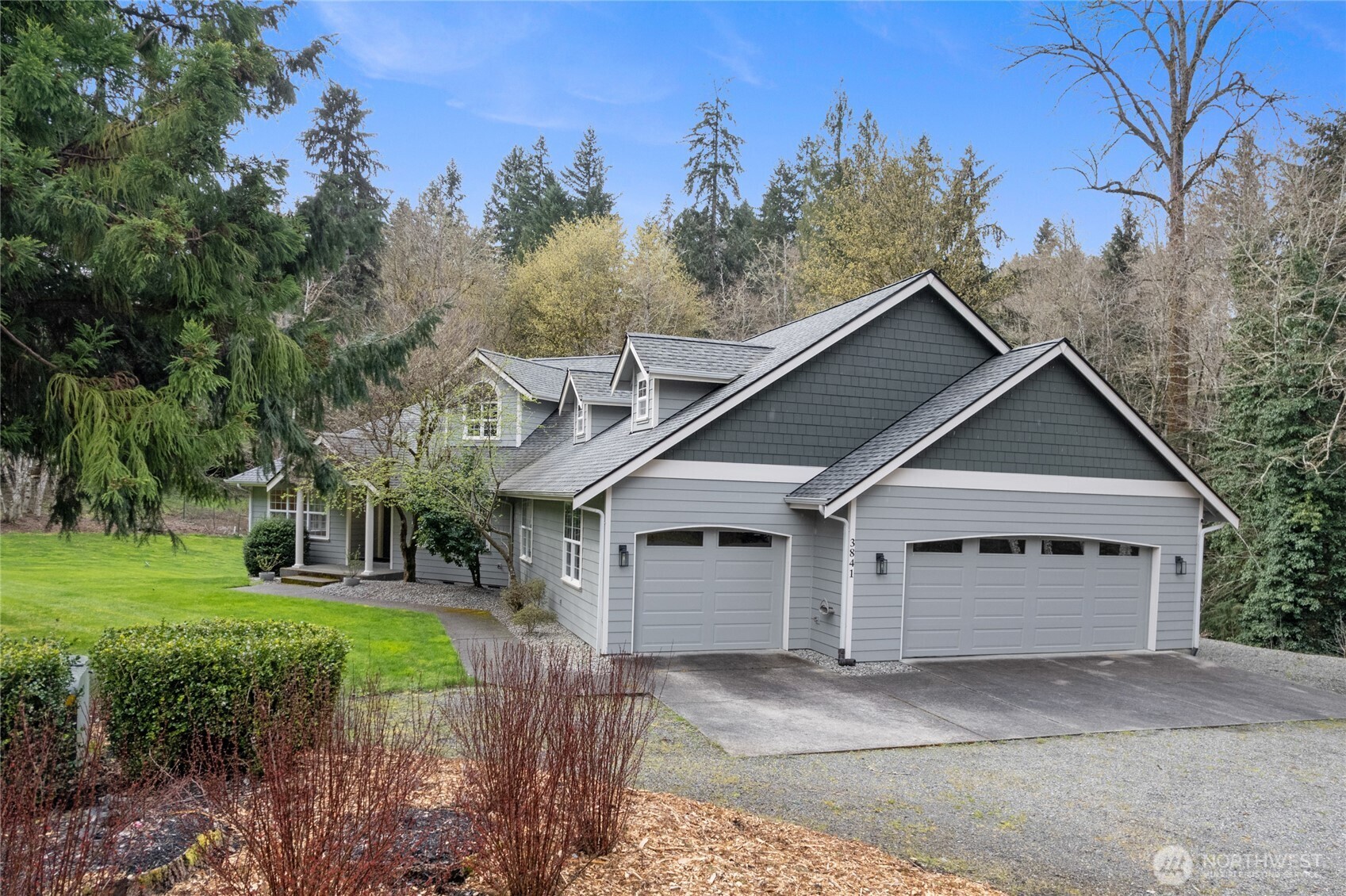 3841 Mari Lane Southeast Olympia, WA 98513 - Photo 3 of 40 front view of a house with a garden