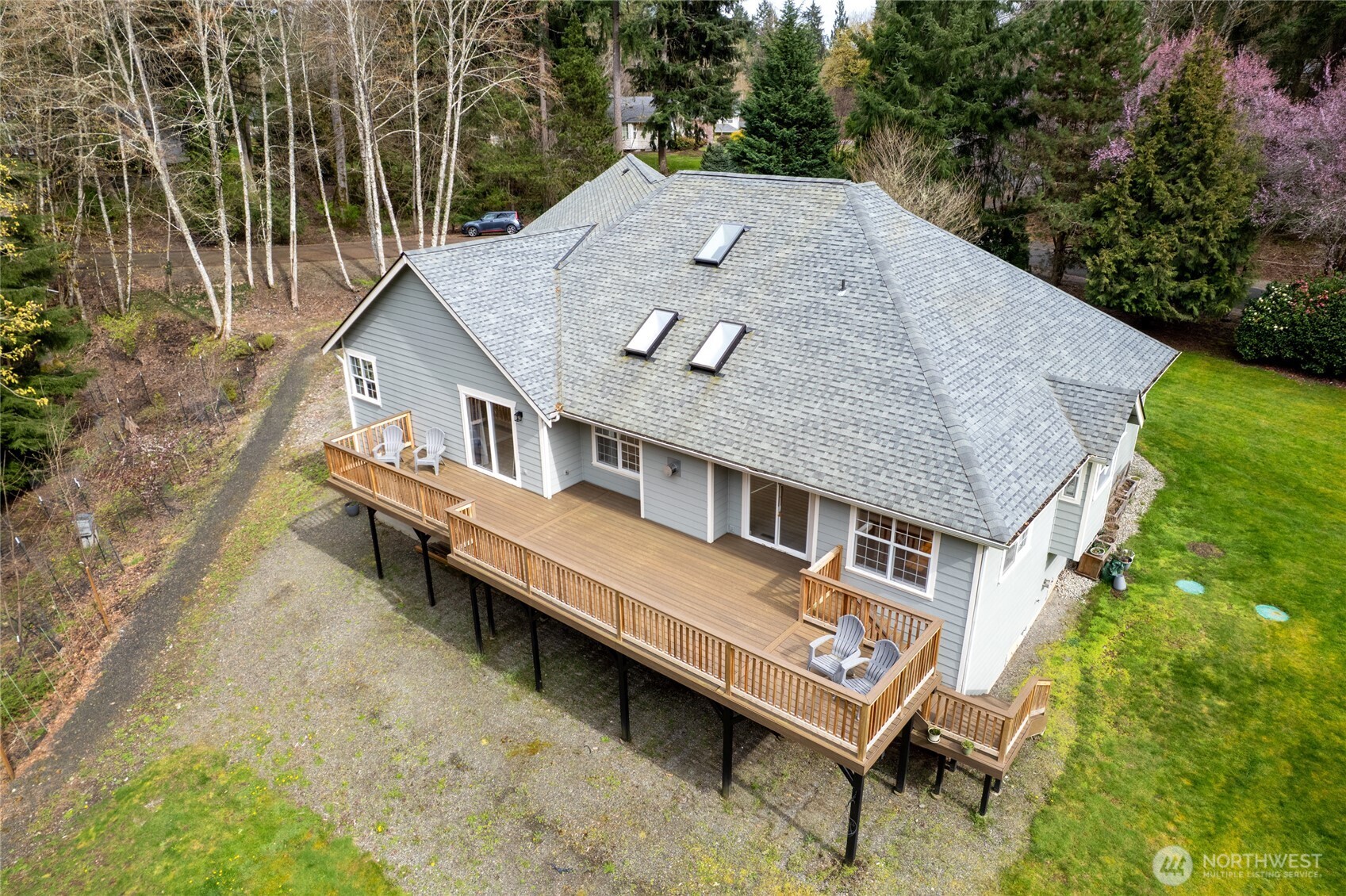 3841 Mari Lane Southeast Olympia, WA 98513 - Photo 31 of 40 an aerial view of a house with a yard and sitting area