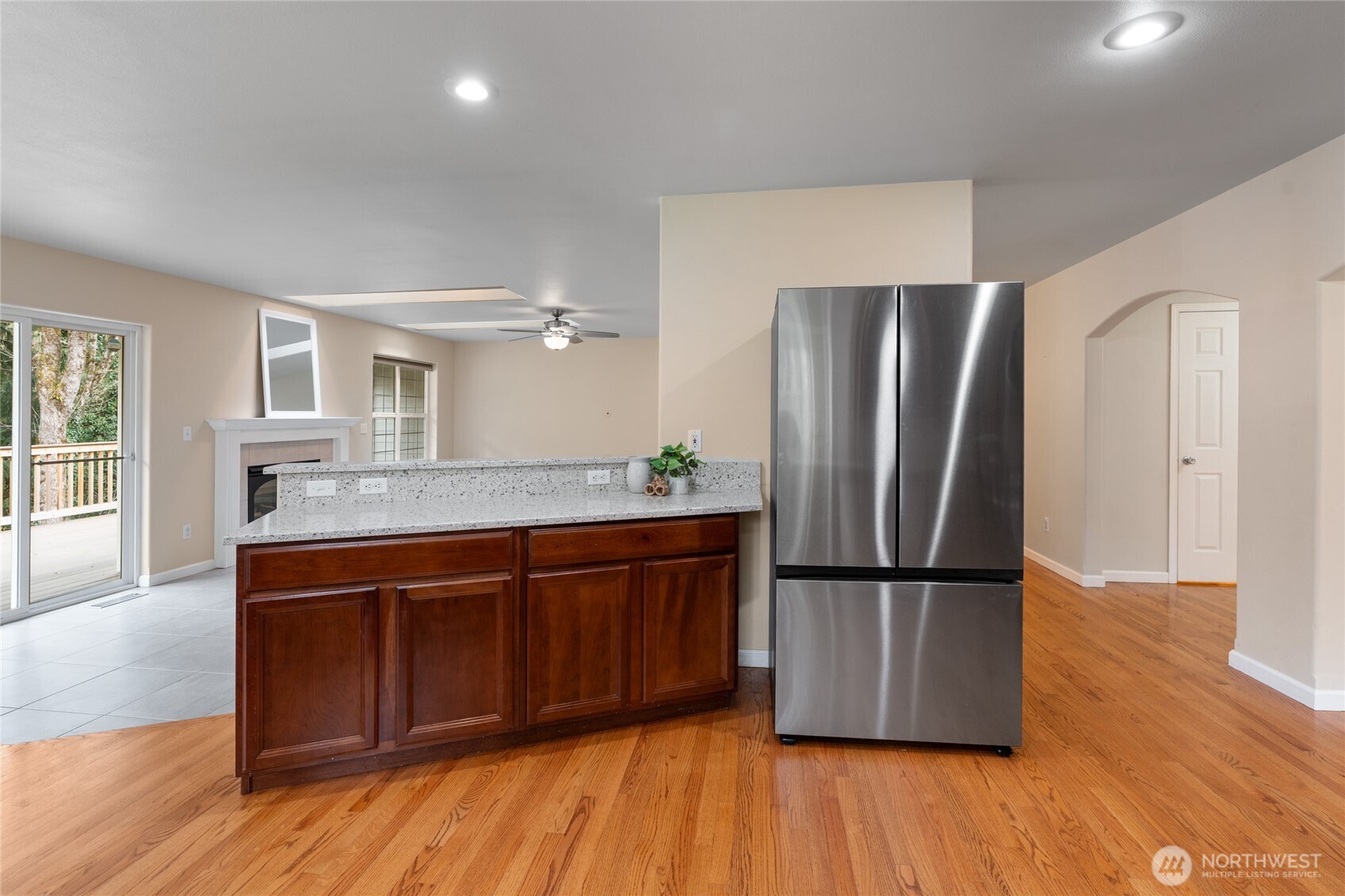 3841 Mari Lane Southeast Olympia, WA 98513 - Photo 9 of 40 a kitchen with stainless steel appliances granite countertop a refrigerator and a sink