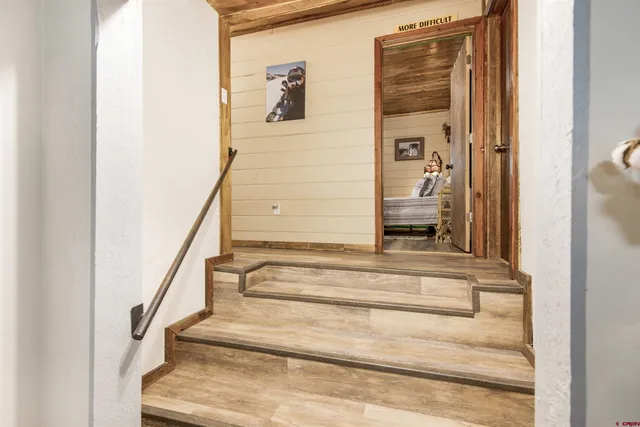 a bathroom with a toilet and a bathtub