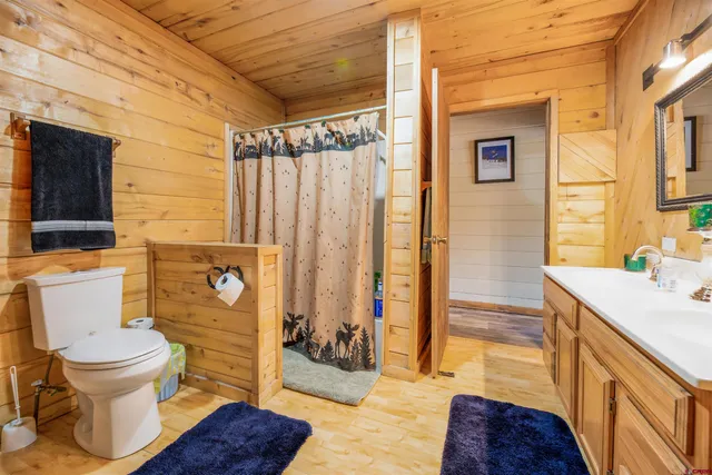 a view of balcony with wooden floor