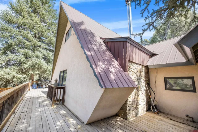 a house with trees in the background