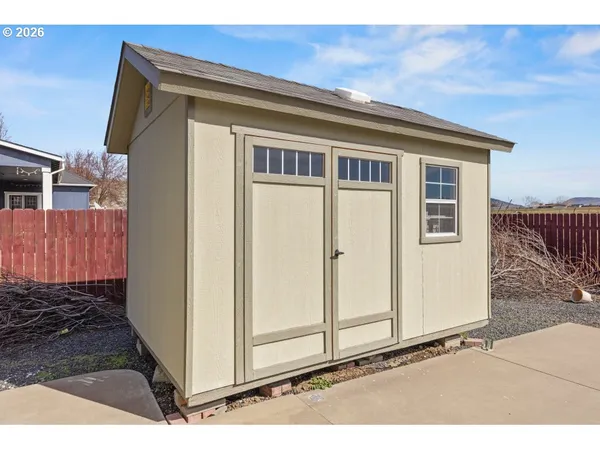 a front view of a house with a garage
