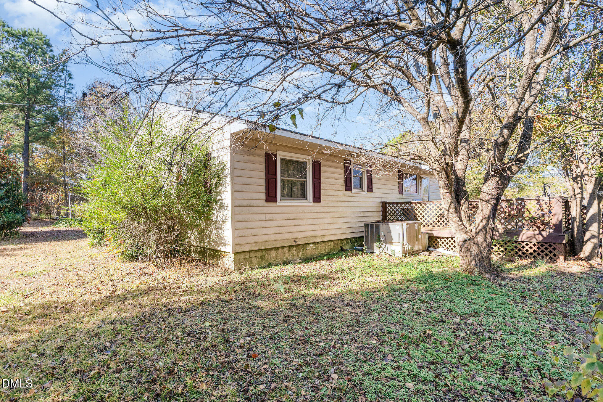 2396 Mitchell Road Angier, NC 27501 - Photo 14 of 21 a house with trees in front of it