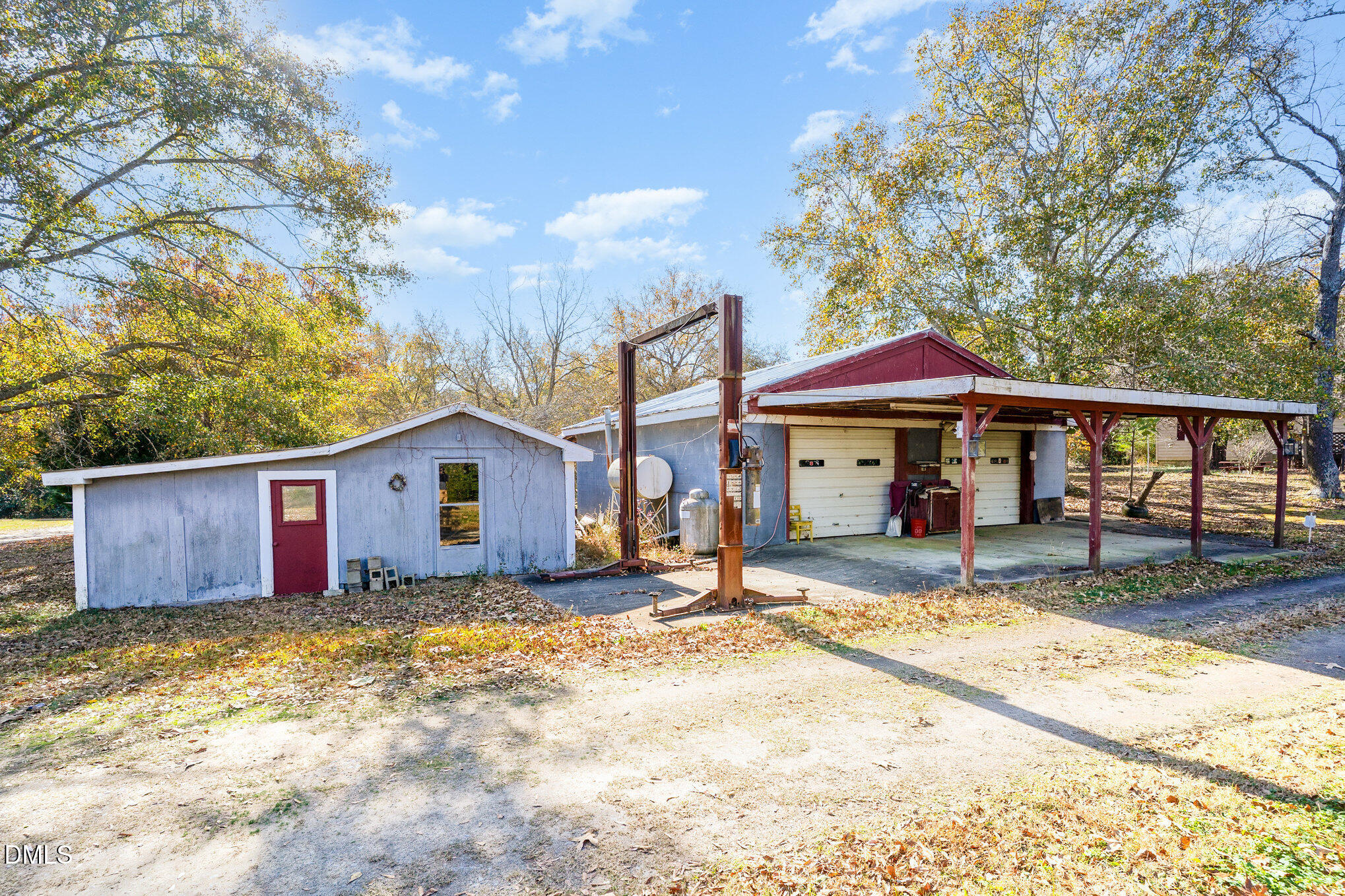 2396 Mitchell Road Angier, NC 27501 - Photo 18 of 21 a view of a house with a yard and wooden fence