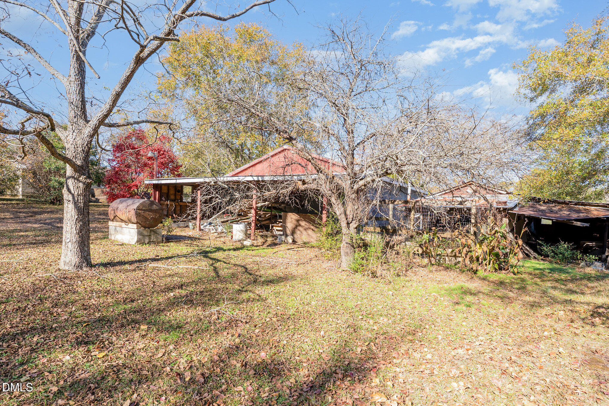 2396 Mitchell Road Angier, NC 27501 - Photo 19 of 21 a view of a yard covered in snow