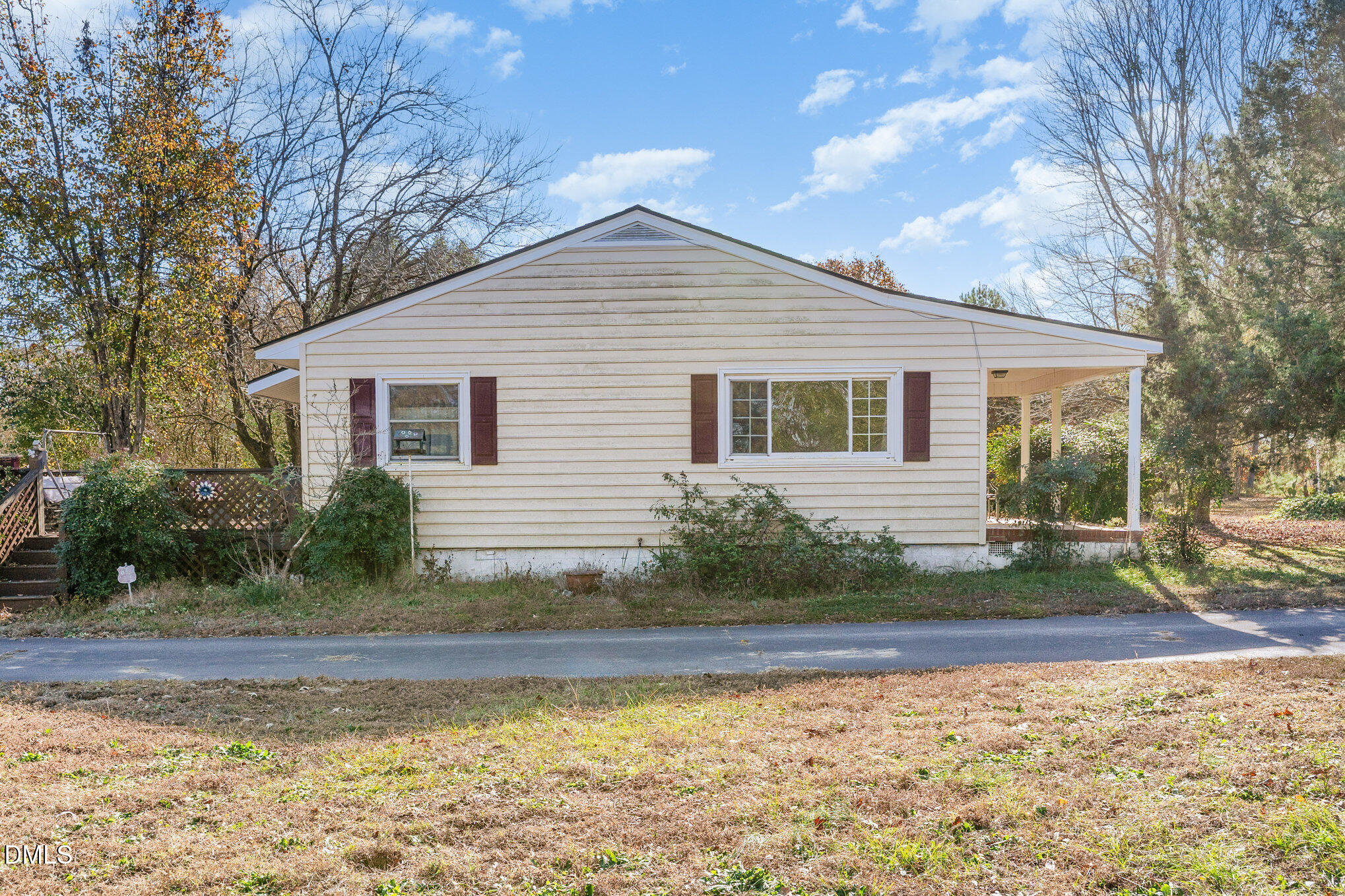 2396 Mitchell Road Angier, NC 27501 - Photo 4 of 21 a view of a house with backyard and trees