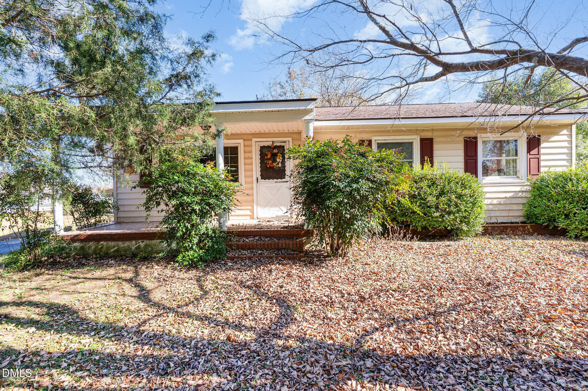 2396 Mitchell Road Angier, NC 27501 - Photo 6 of 21 a front view of a house with garden