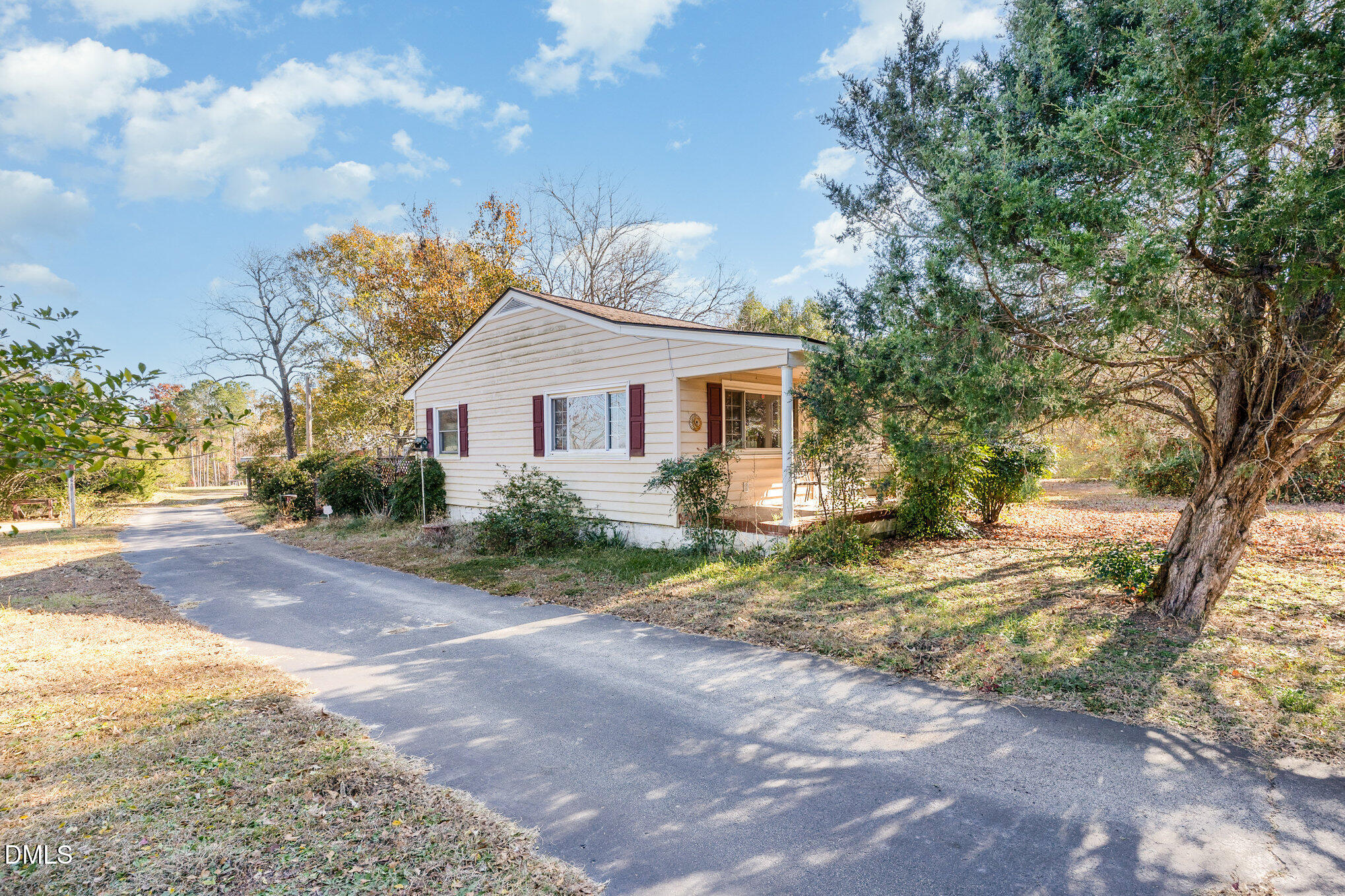 2396 Mitchell Road Angier, NC 27501 - Photo 8 of 21 a view of a house with a yard and large tree