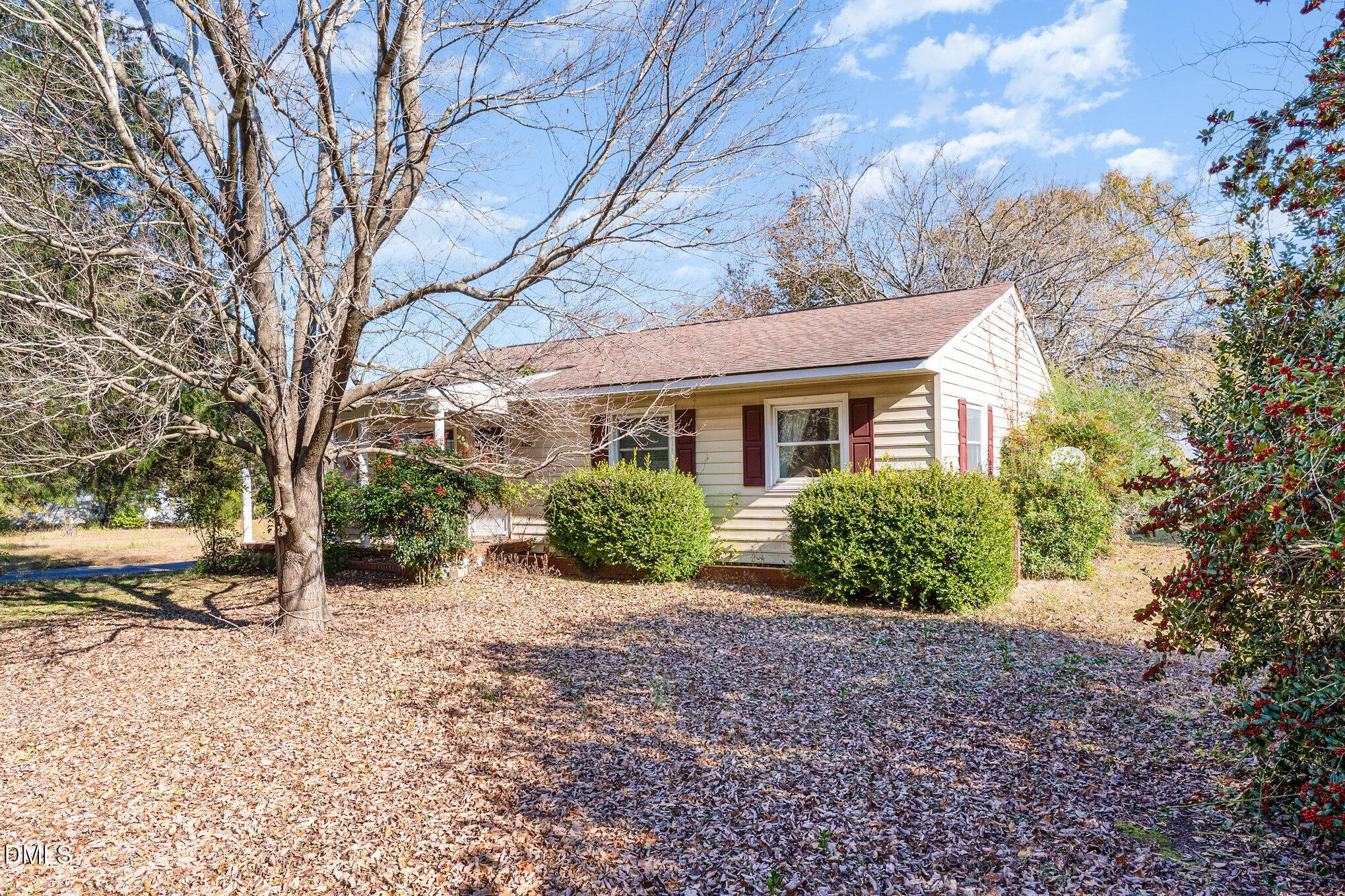 2396 Mitchell Road Angier, NC 27501 - Photo 9 of 21 a view of a house with a yard covered in snow