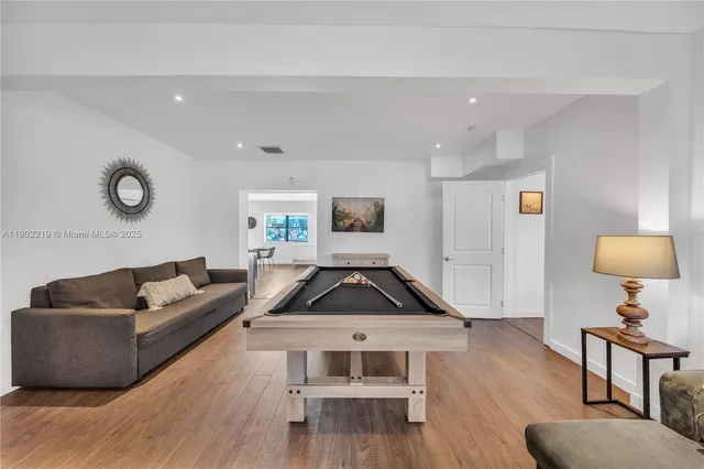 a bathroom with a sink a toilet and bathtub