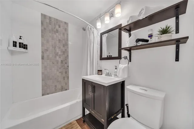 a view of a backyard with swimming pool