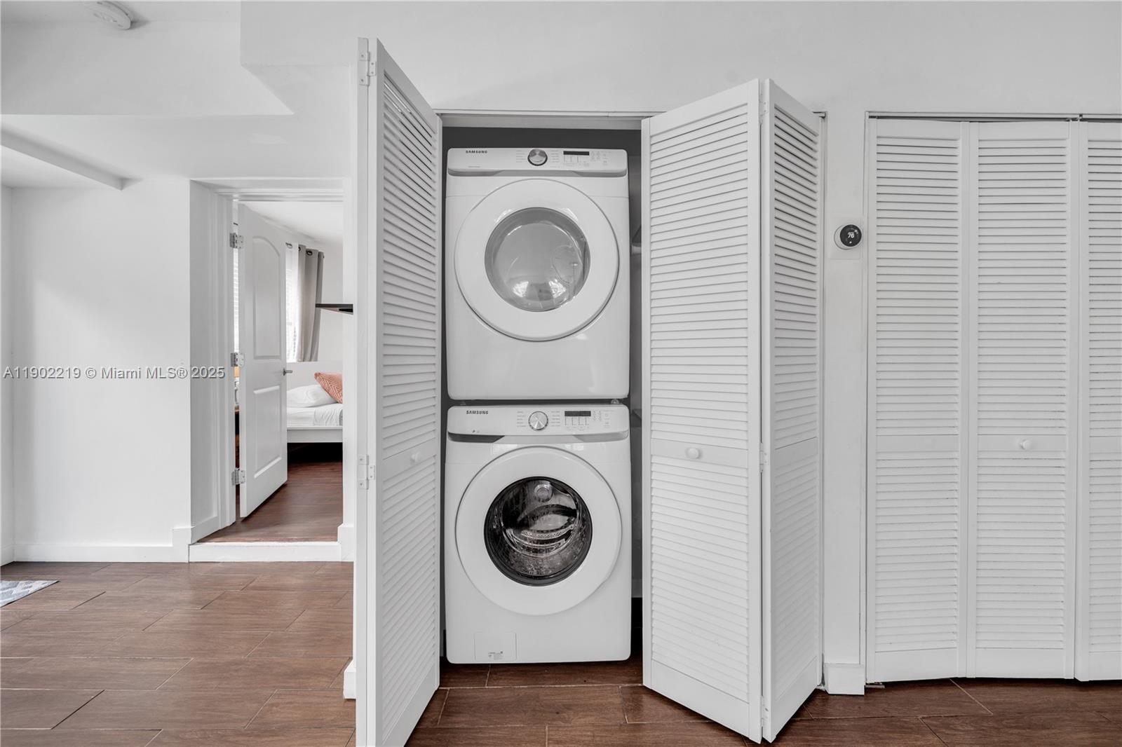 710 Northeast 141st Street North Miami, FL 33161 - Photo 29 of 78 a view of a storage and utility room with washer and dryer