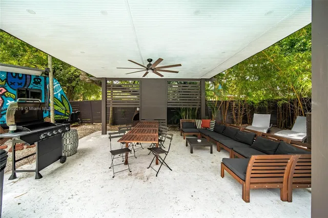a view of an chairs and tables in the patio