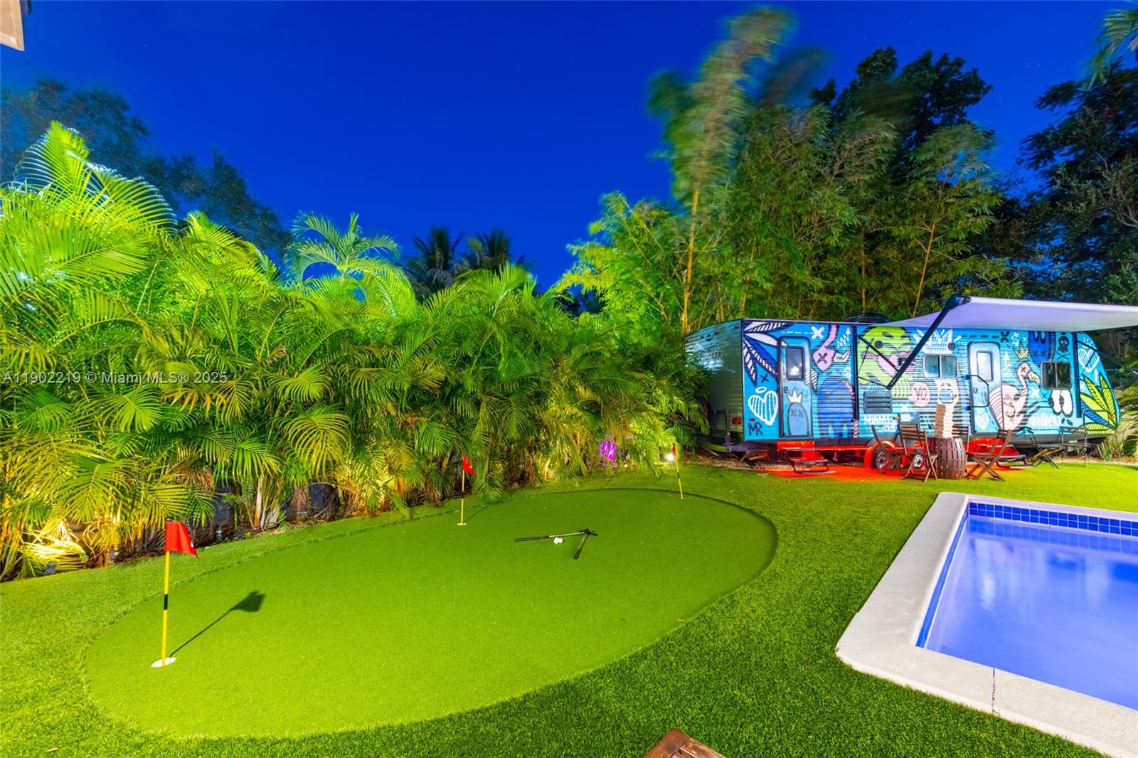 710 Northeast 141st Street North Miami, FL 33161 - Photo 49 of 78 a view of an outdoor space pool patio and outdoor seating