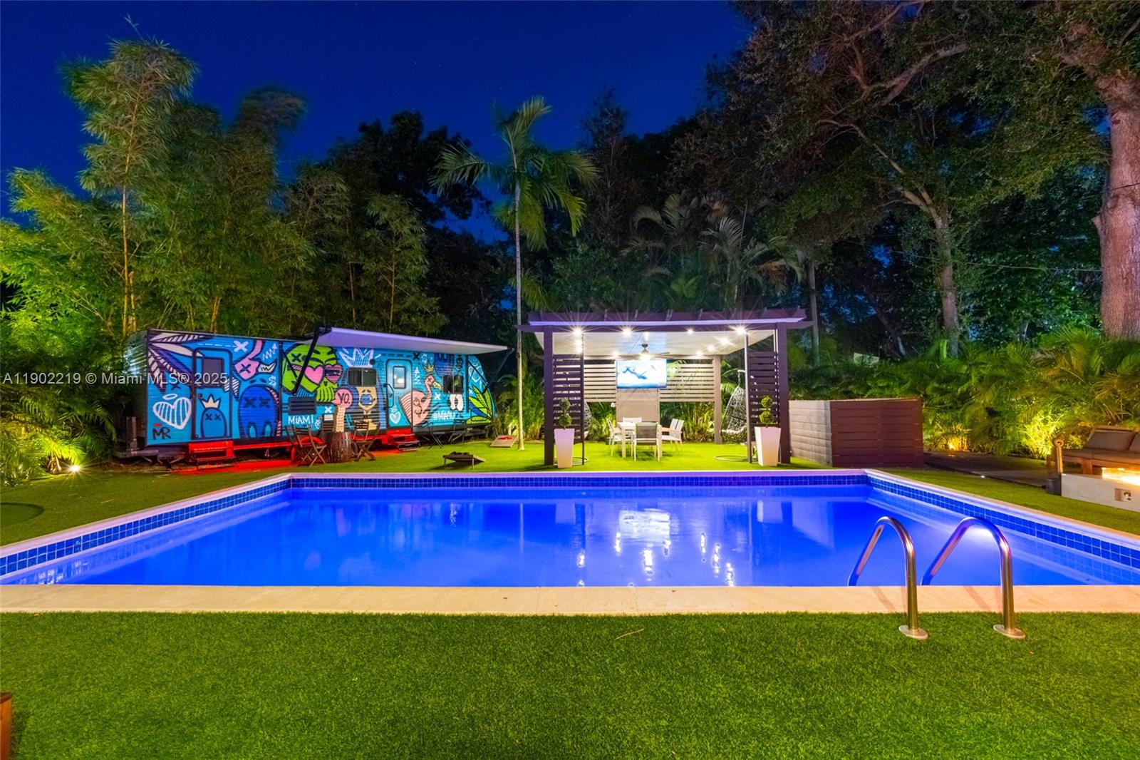 710 Northeast 141st Street North Miami, FL 33161 - Photo 51 of 78 a view of yard with swimming pool and outdoor seating