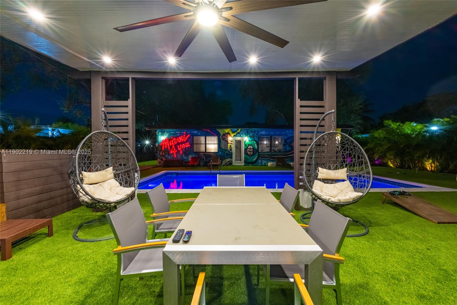 710 Northeast 141st Street North Miami, FL 33161 - Photo 59 of 78 a view of an chairs and tables in the patio